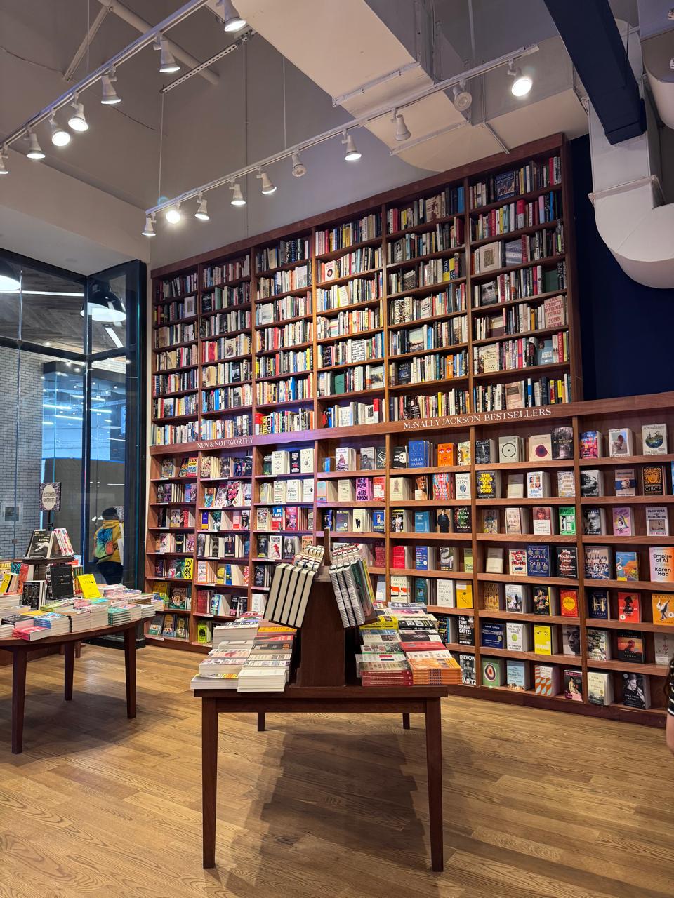 A bookstore with floor-to-ceiling shelves